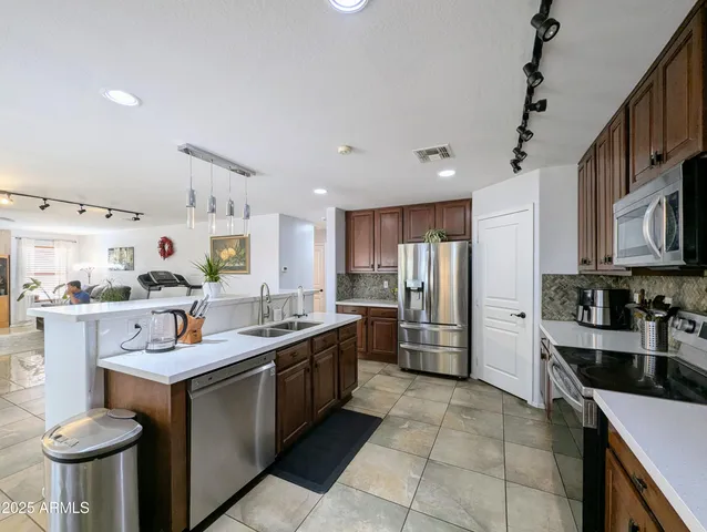 a living room with furniture and a table