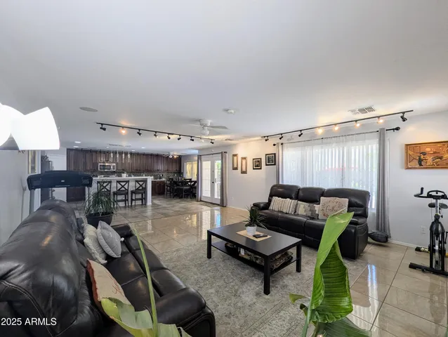 a bedroom with a bed furniture and a window