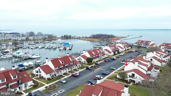 an aerial view of a house with a ocean view