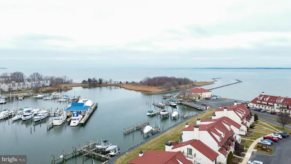 a aerial view of a house with a lake view