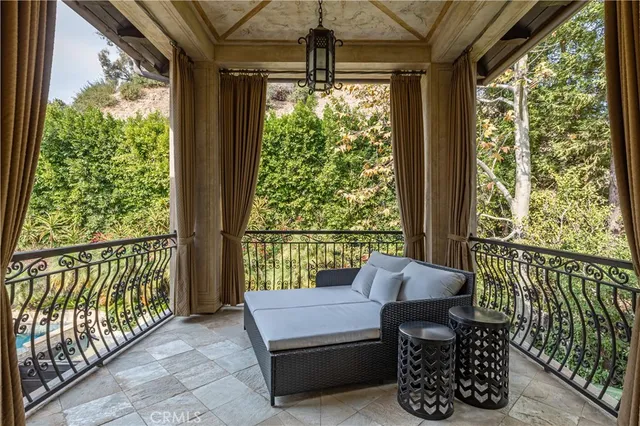 a outdoor living space with furniture and a potted plant