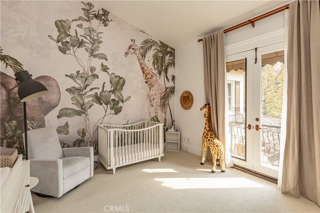 12094 Summit Circle Beverly Hills, CA 90210 - Photo 17 of 23 a view of a livingroom with a white bed and a chair