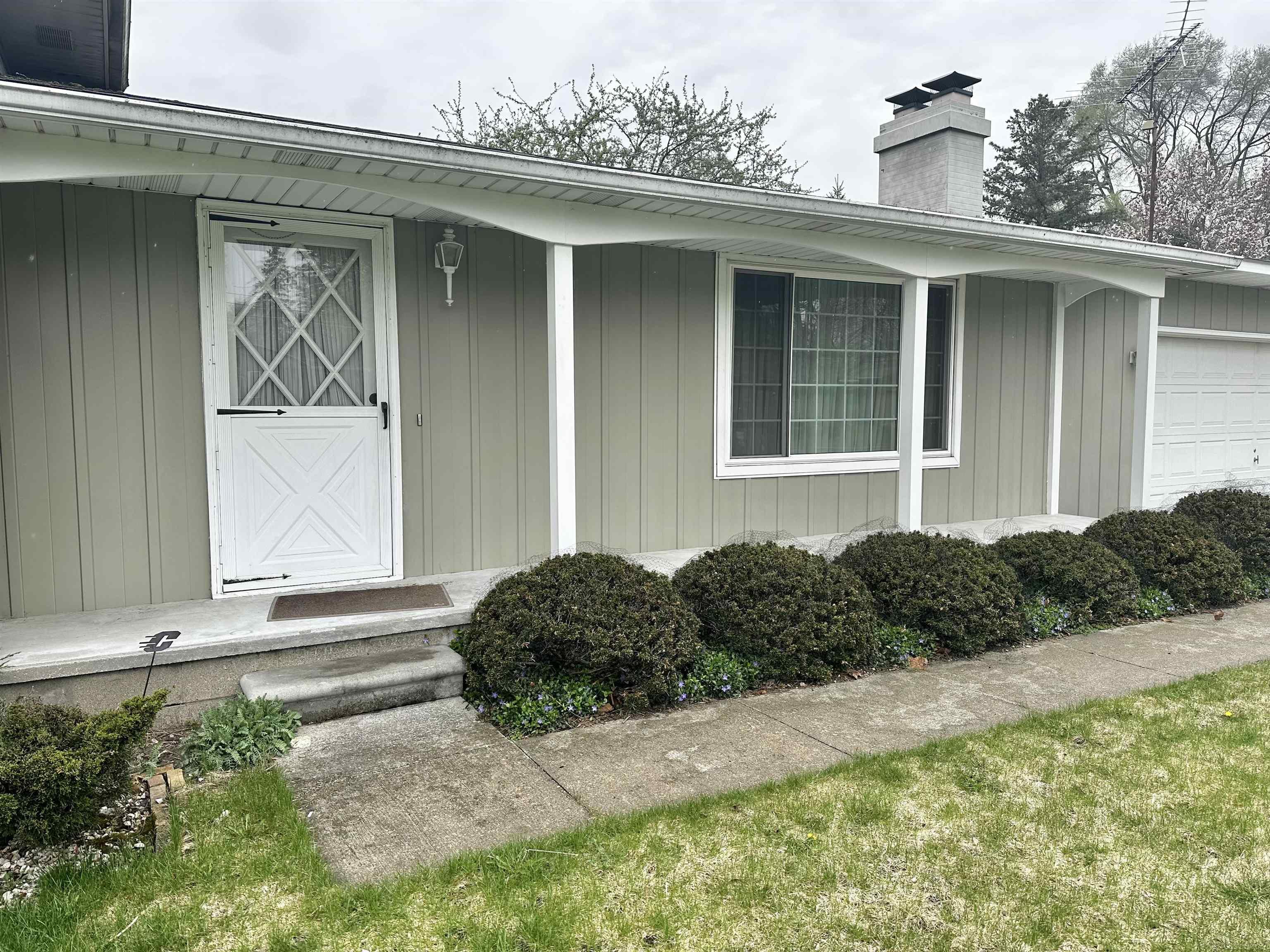 1420 Watson Road Mount Pleasant, MI 48858 - Photo 2 of 41 Lovely covered porch