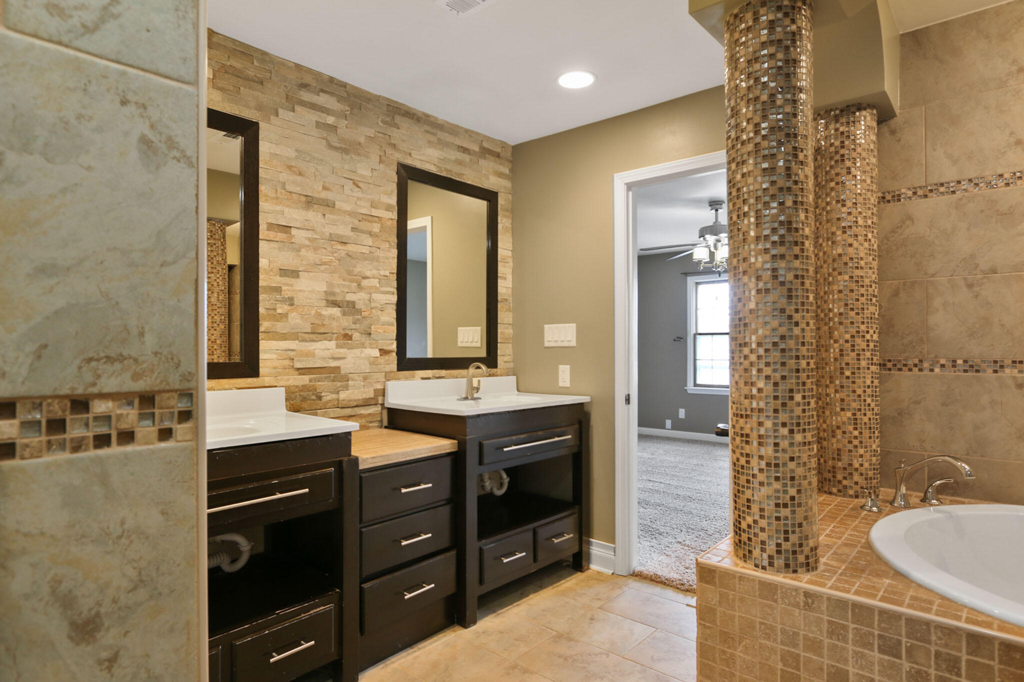 366 Devon Court Valparaiso, IN 46385 - Photo 29 of 45 a bathroom with a double vanity sink mirror and shower