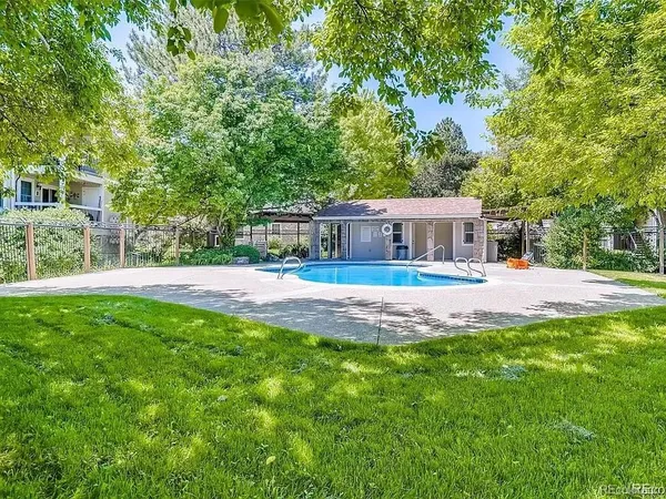 a view of house with a big yard