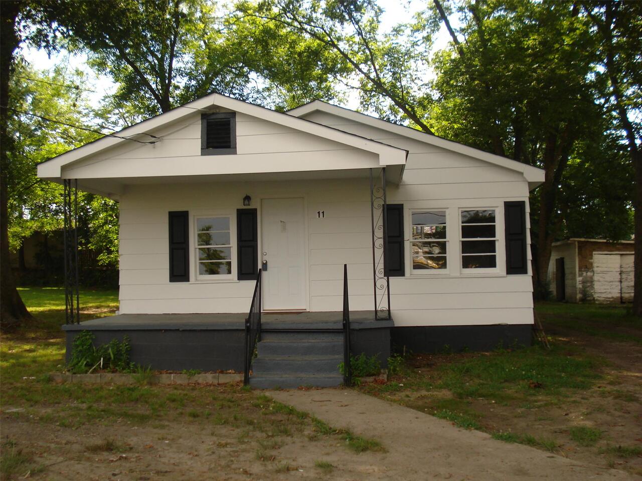 11 Lyons Drive Northwest Rome, GA 30165 - Photo 1 of 1 a front view of a house with a yard