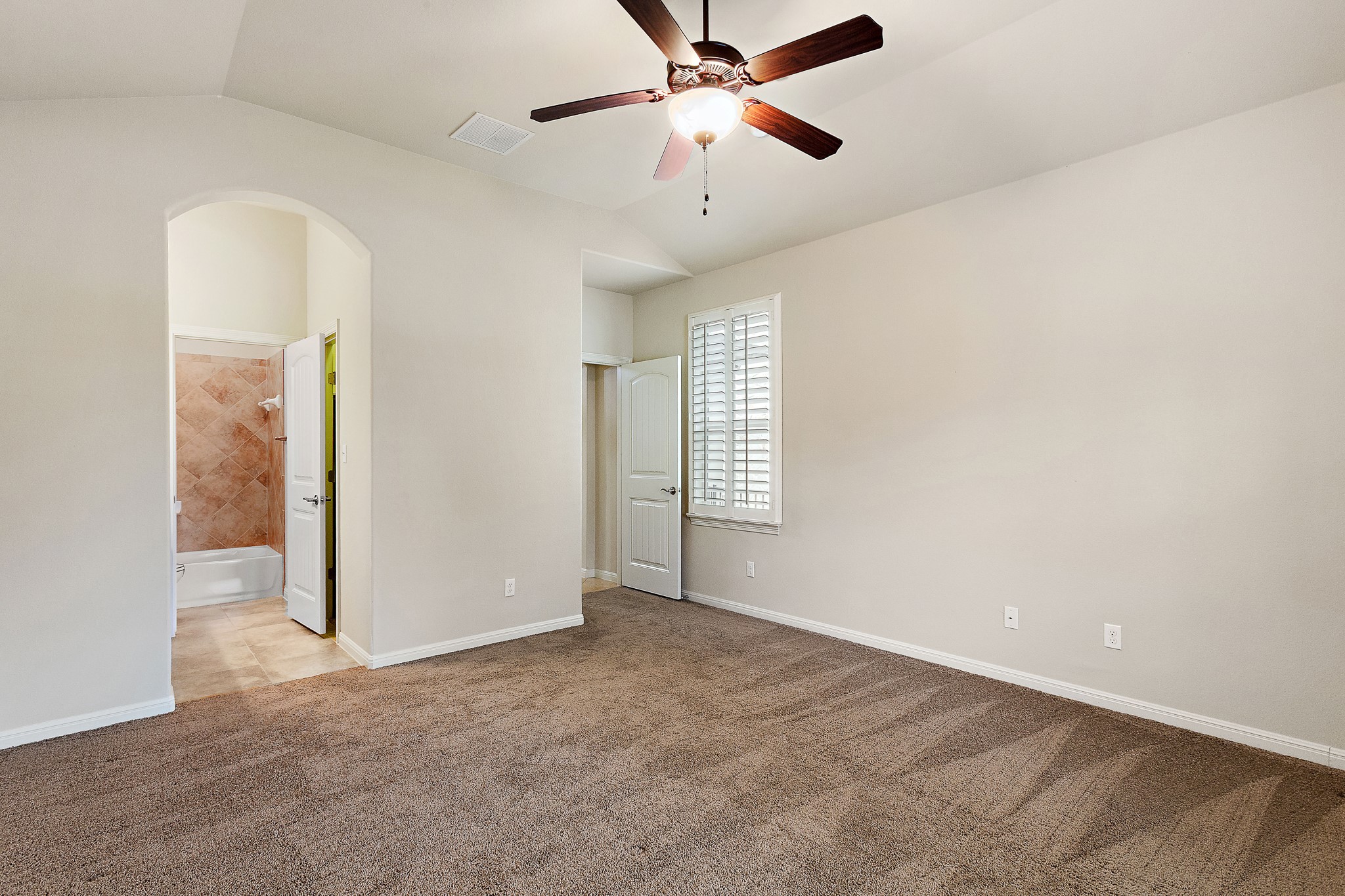 224 Tavish Trail Austin, TX 78738 - Photo 28 of 40 an empty room with windows and fan