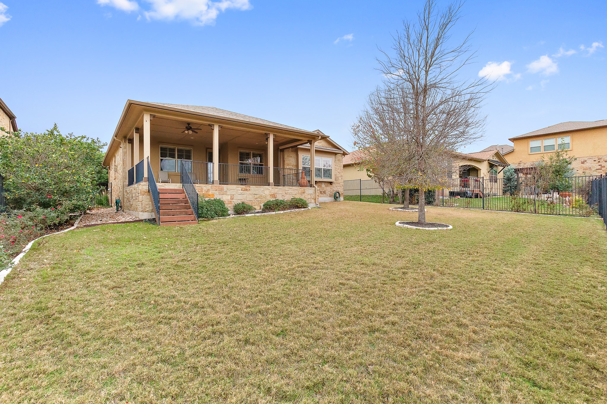 224 Tavish Trail Austin, TX 78738 - Photo 33 of 40 a front view of house with yard and green space