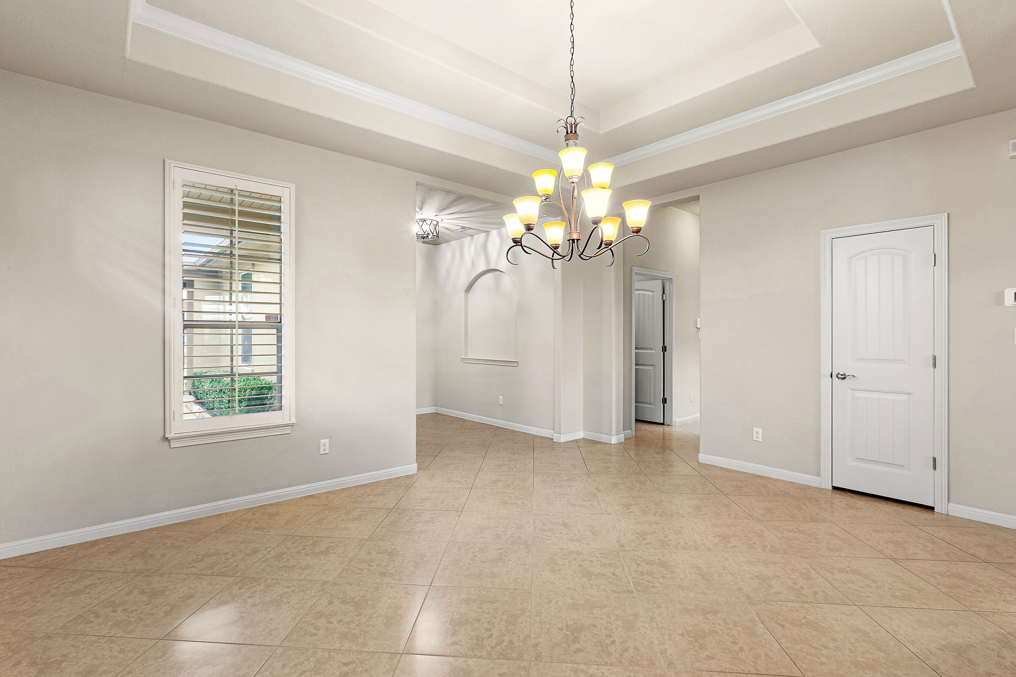 224 Tavish Trail Austin, TX 78738 - Photo 6 of 40 a view of a chandelier in a room with a chandelier