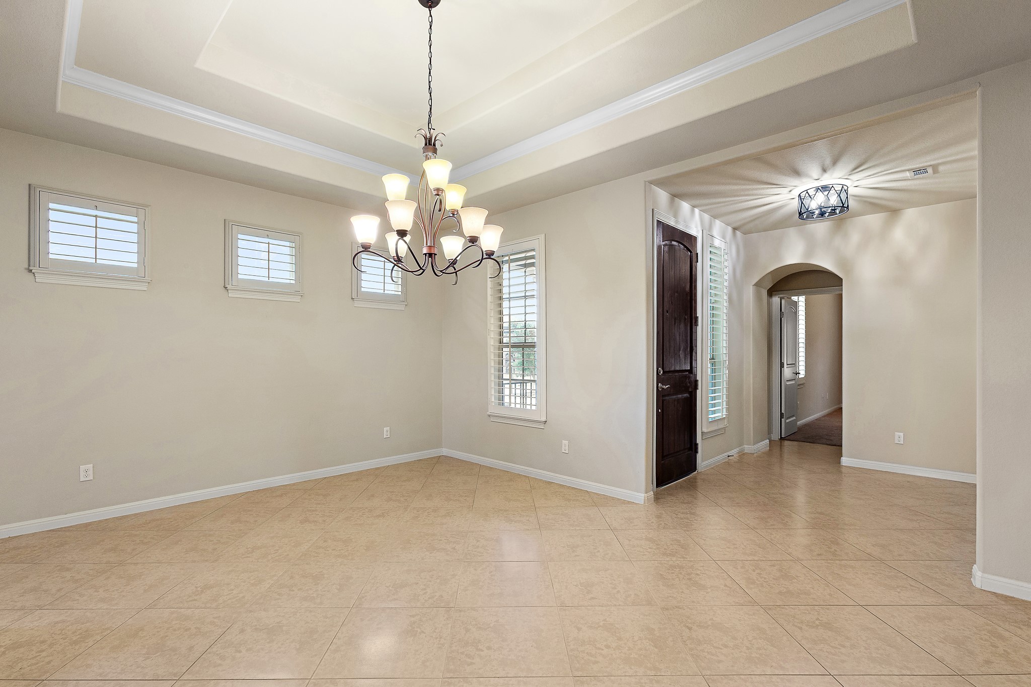 224 Tavish Trail Austin, TX 78738 - Photo 7 of 40 a view of a chandelier and a chandelier in big room