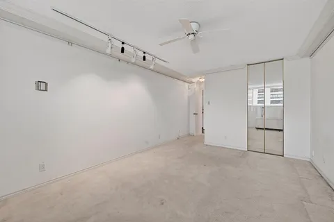 a view of a room with an empty space