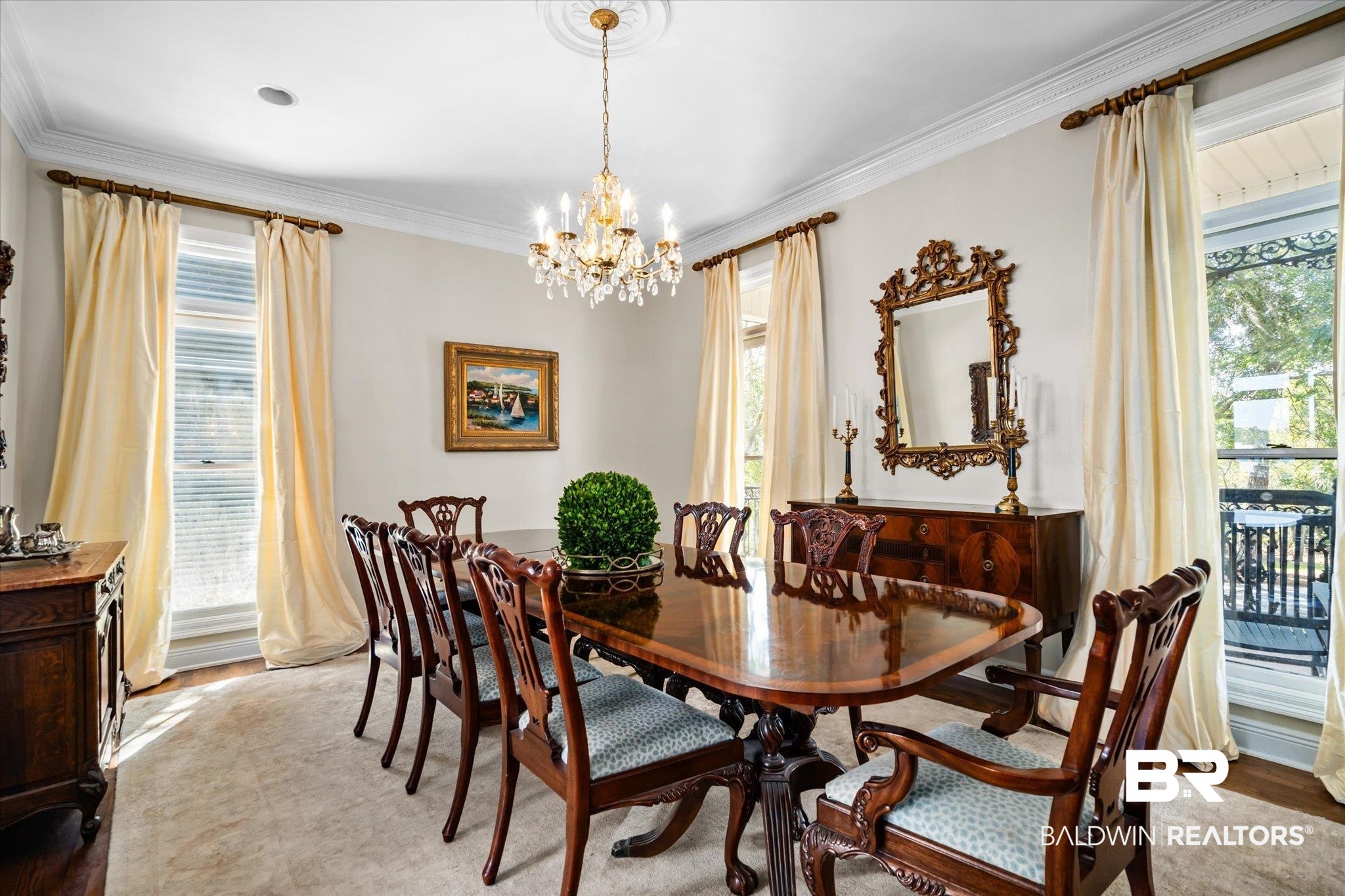 4930 River Trace Theodore, AL 36582 - Photo 16 of 57 Dining area featuring a notable chandelier, ornamental molding, light hardwood / wood-style flooring, and plenty of natural light
