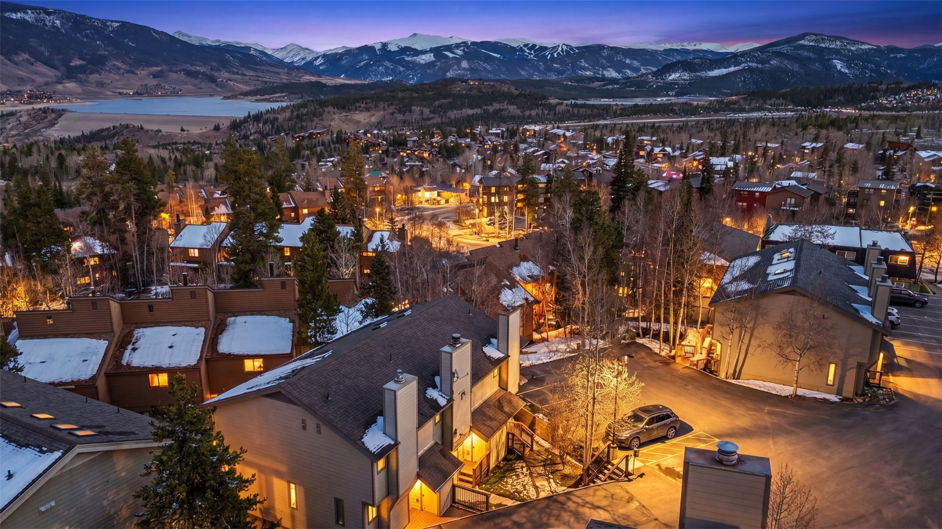 6920 Ryan Gulch Road, Unit 6920 Silverthorne, CO 80498 - Photo 3 of 48 an aerial view of a house with a lake view