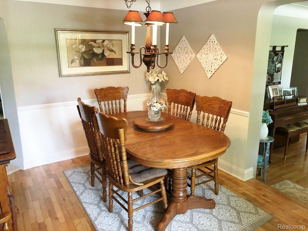 3892 South Latson Road Howell, MI 48843 - Photo 11 of 26 Formal dining room with hardwood.