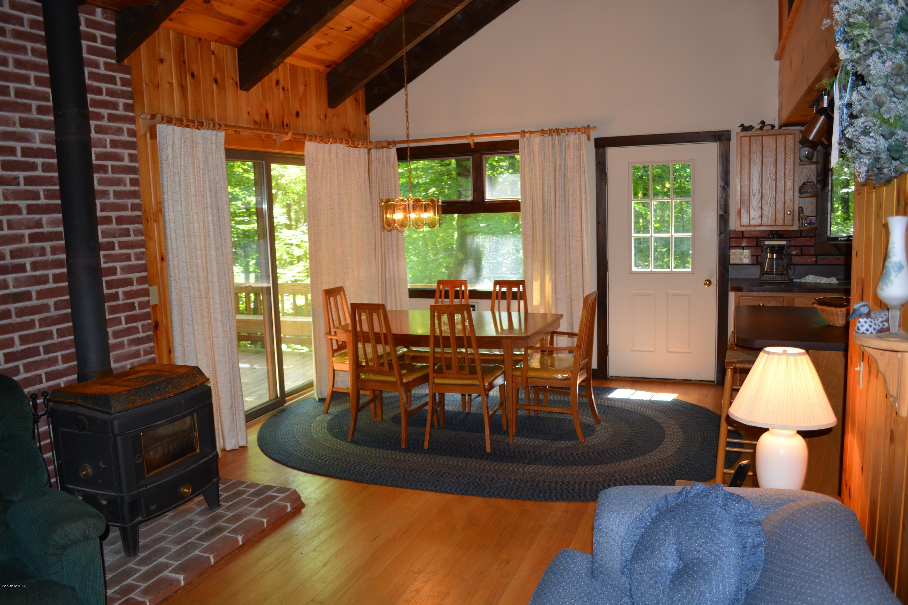 56 Slope Road Tolland, MA 01034 - Photo 2 of 52 a living room with furniture and a floor to ceiling window