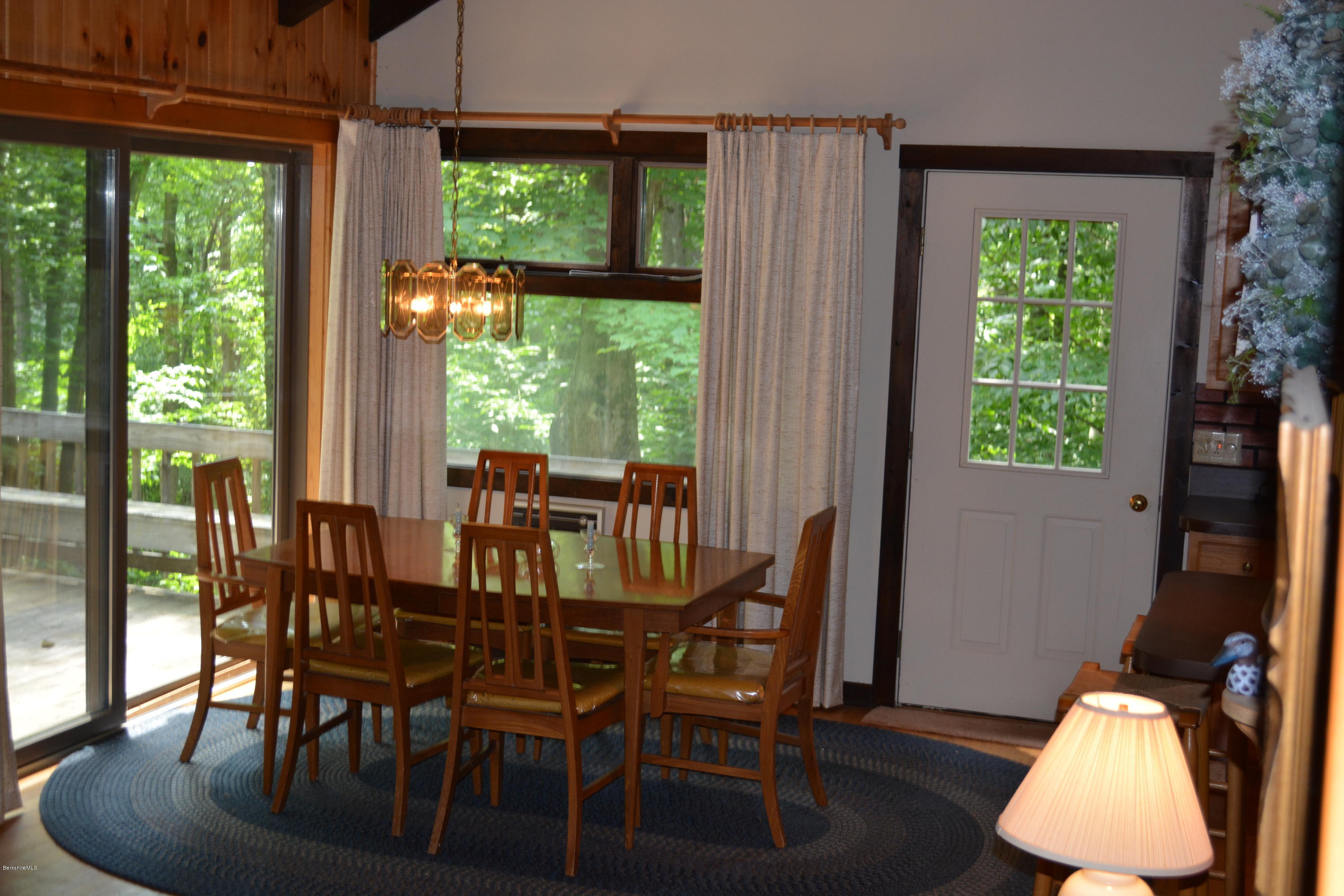 56 Slope Road Tolland, MA 01034 - Photo 14 of 52 a view of a dining room with furniture window and outside view
