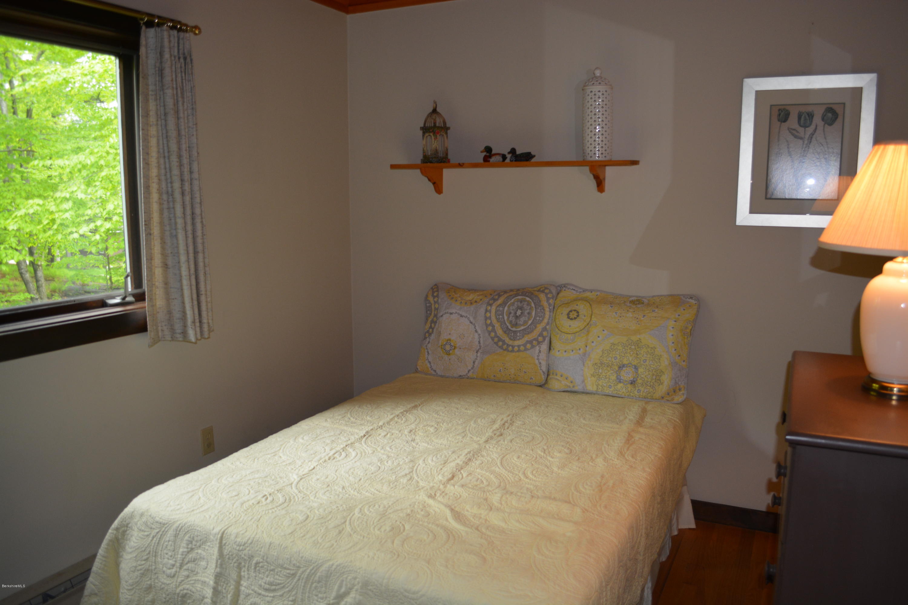 56 Slope Road Tolland, MA 01034 - Photo 26 of 52 a bed room with a bed and a window