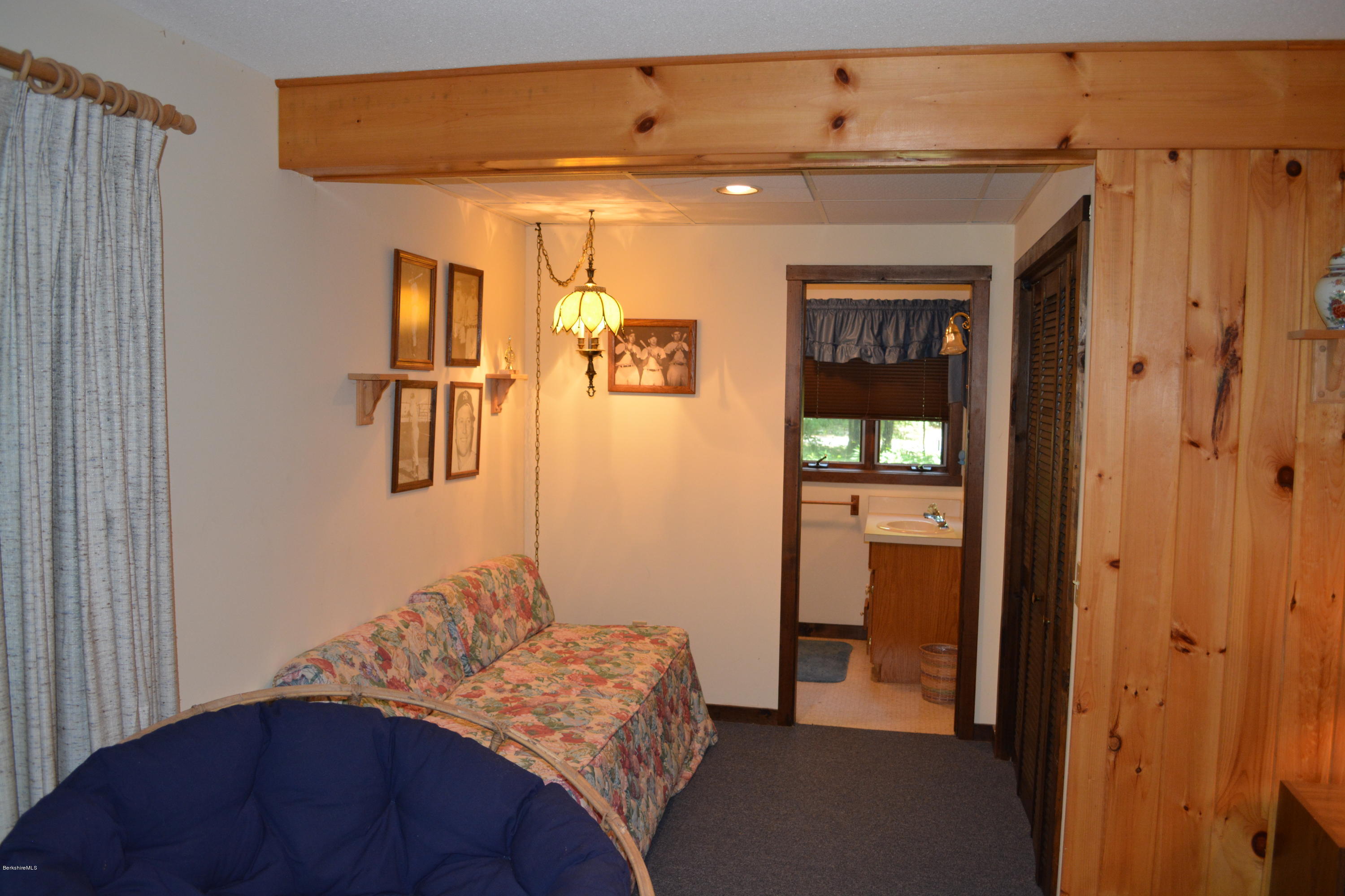 56 Slope Road Tolland, MA 01034 - Photo 29 of 52 a bedroom with a bed and a dresser