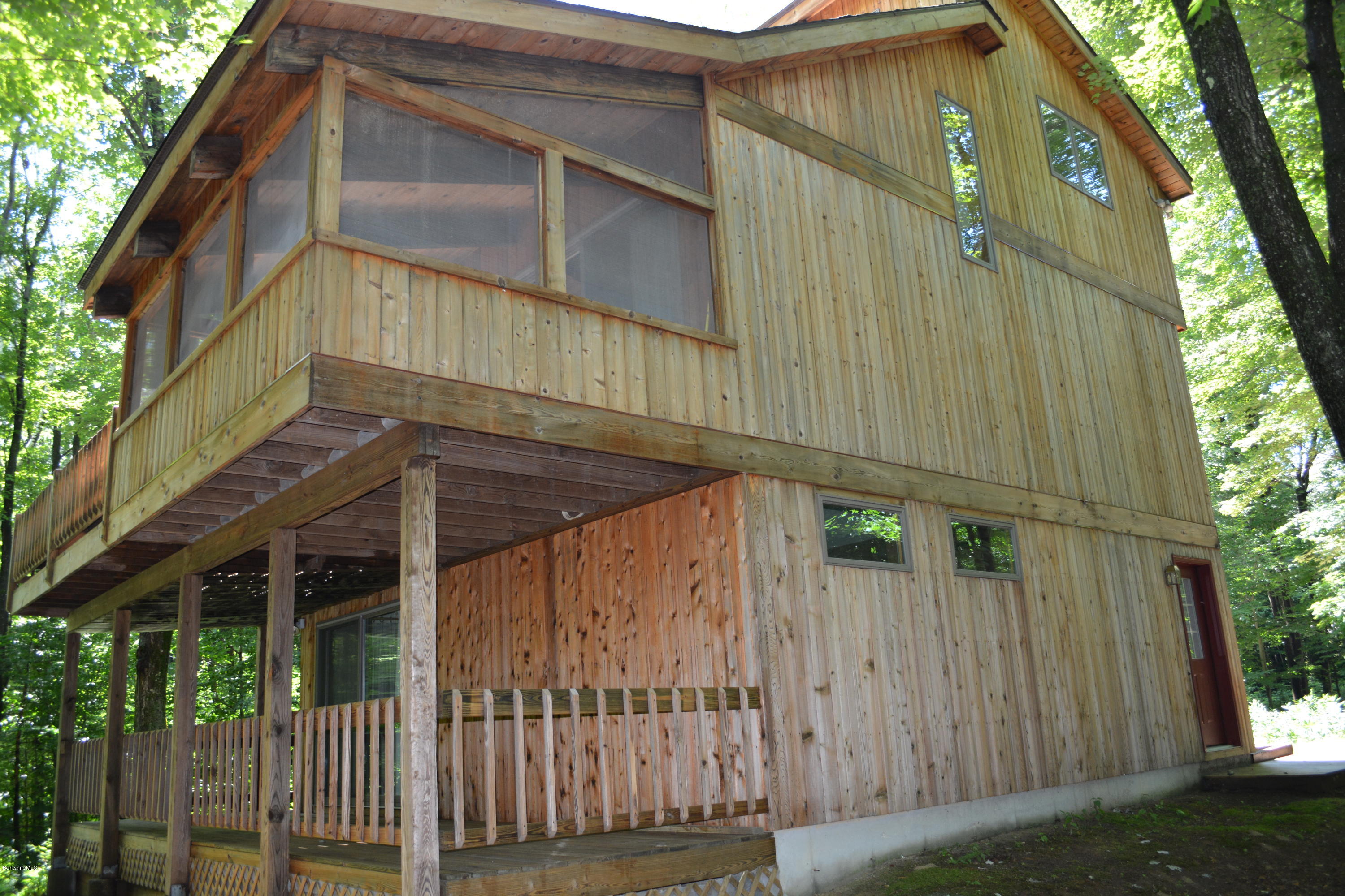 56 Slope Road Tolland, MA 01034 - Photo 32 of 52 a view of a small house