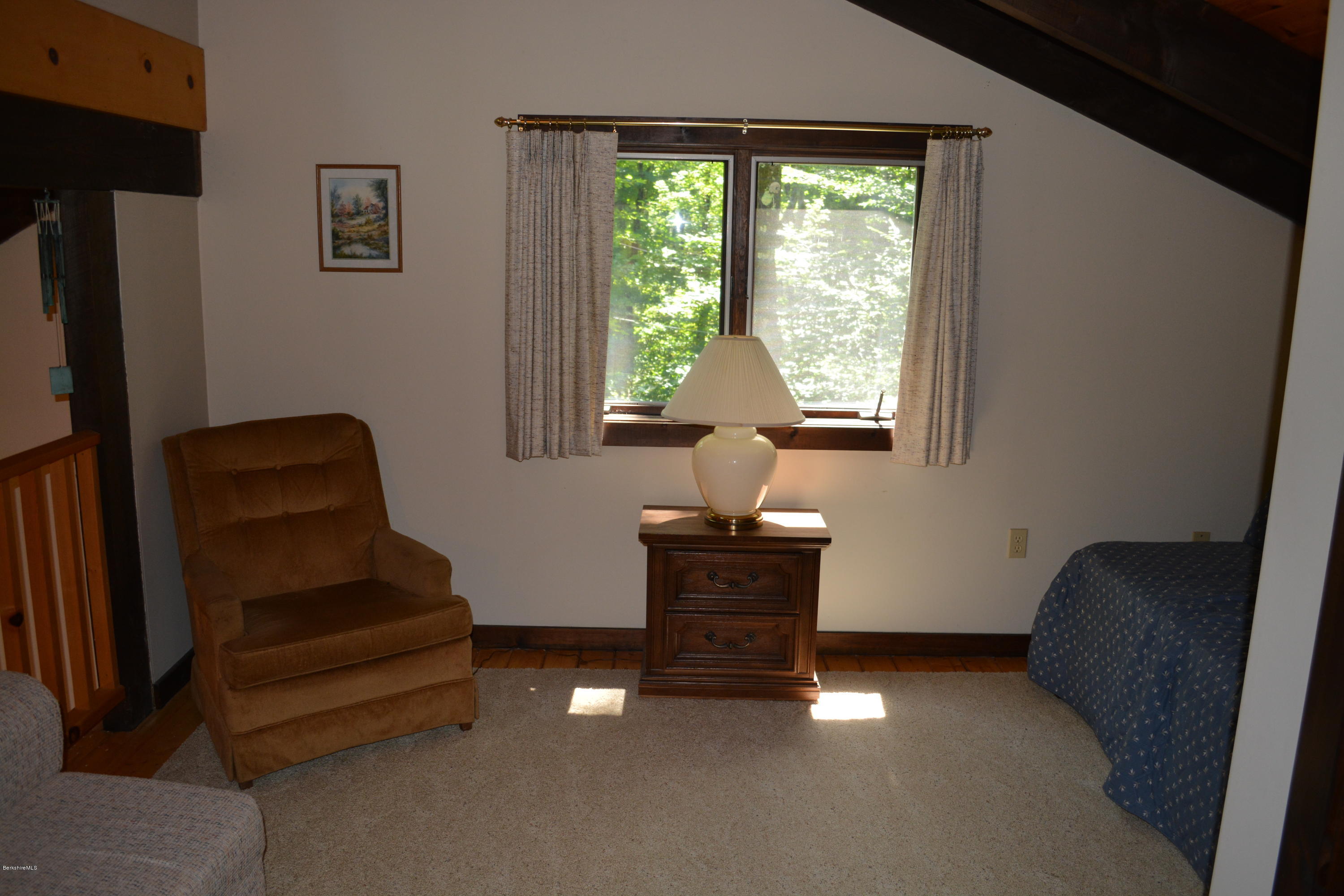 56 Slope Road Tolland, MA 01034 - Photo 35 of 52 a living room with furniture and a window