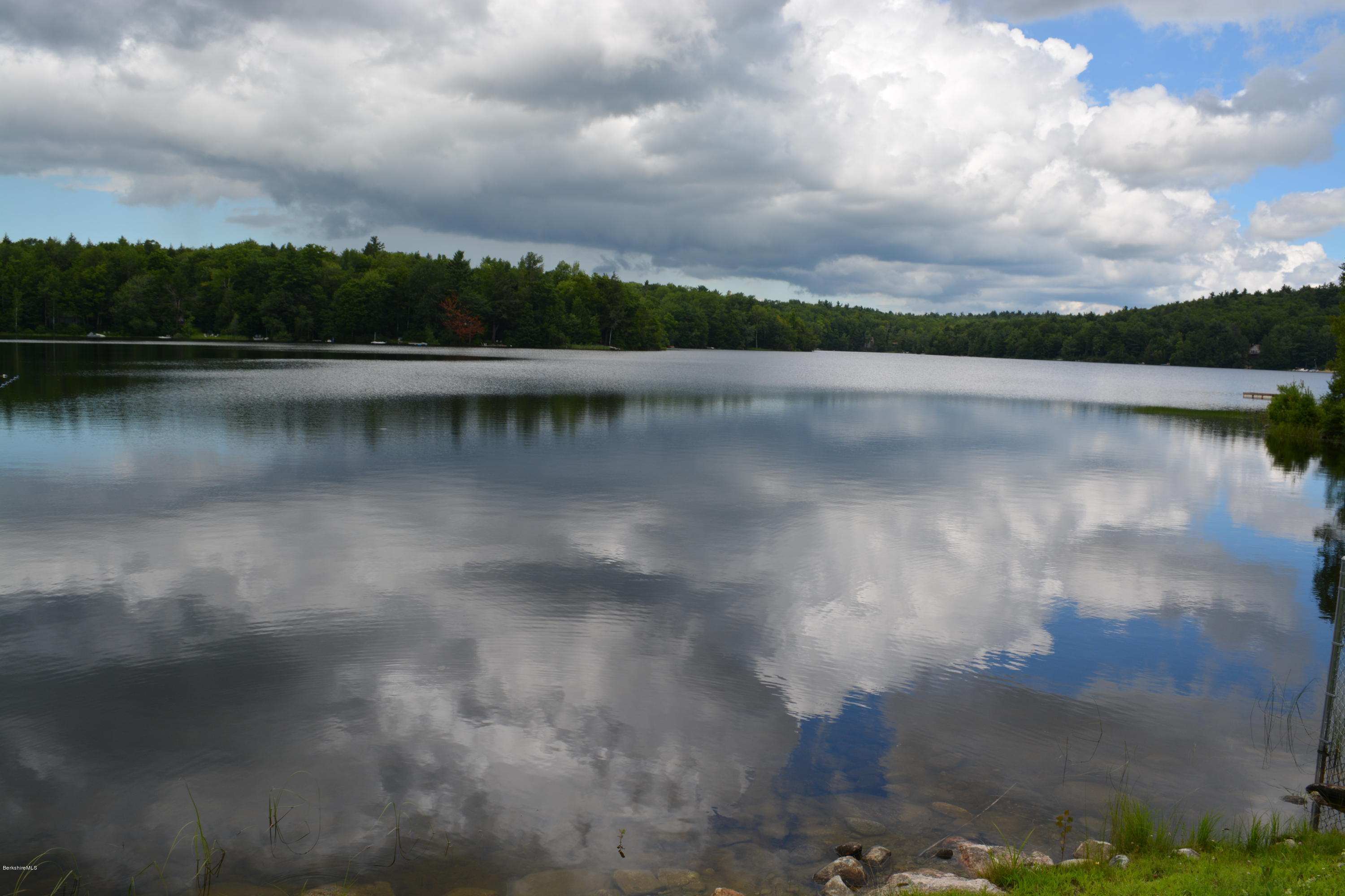 56 Slope Road Tolland, MA 01034 - Photo 39 of 52 a view of a lake