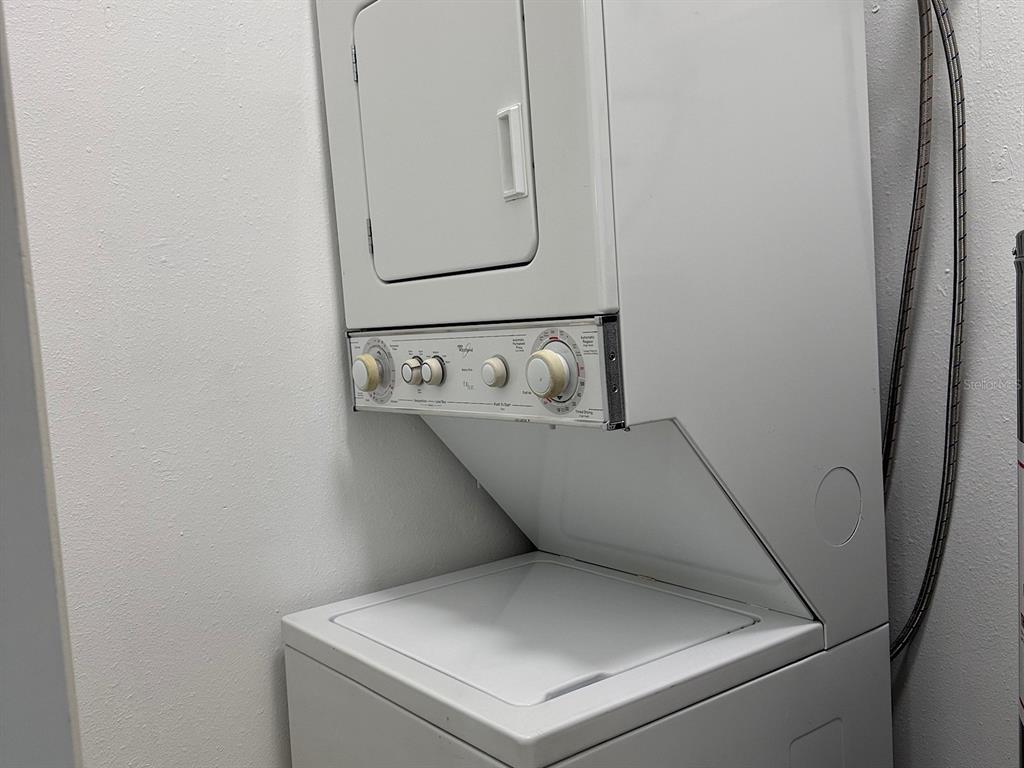 623 Beckett Way, Unit A Tarpon Springs, FL 34689 - Photo 9 of 19 a utility room with dryer and washer