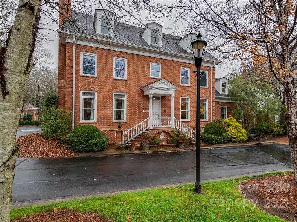 2131 Rolston Drive Charlotte, NC 28207 - Photo 1 of 35 a front view of a house with garden