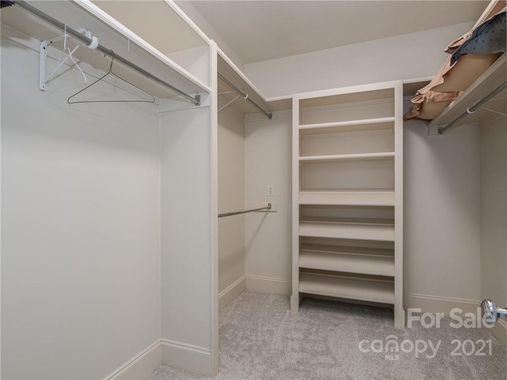 2131 Rolston Drive Charlotte, NC 28207 - Photo 28 of 35 a view of walk in closet with empty racks