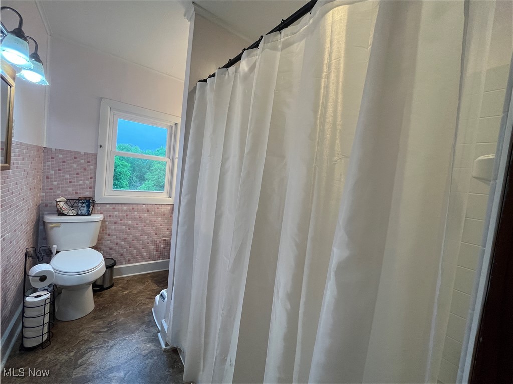 9355 Dozer Ridge Road Blue Rock, OH 43720 - Photo 9 of 23 Full bathroom with toilet and brick wall