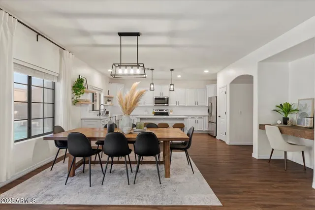a view of a dining room with furniture