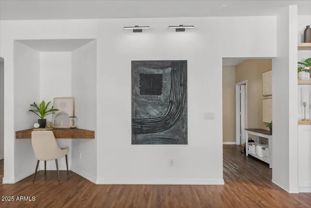 a kitchen with stainless steel appliances granite countertop a sink and stove top oven