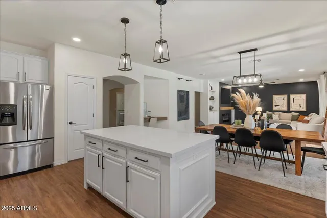 a bathroom with a toilet a sink and a mirror