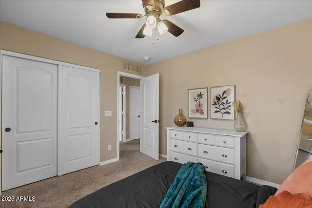 a view of a backyard with plants and porch