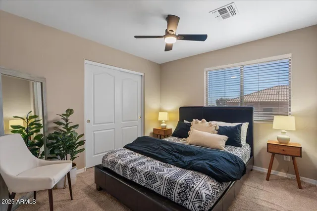 a view of backyard with seating area and green space