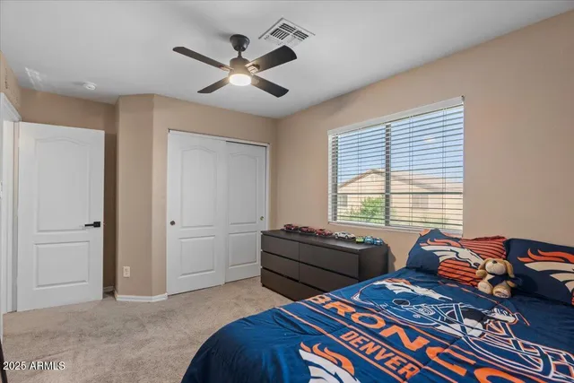 a view of backyard with outdoor seating and green space