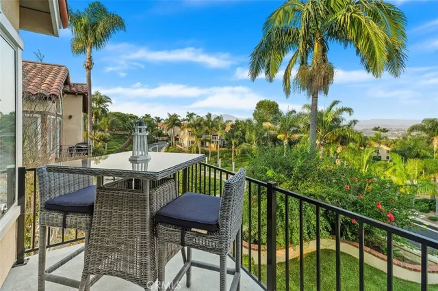 a spacious bedroom with a bathtub and a couch