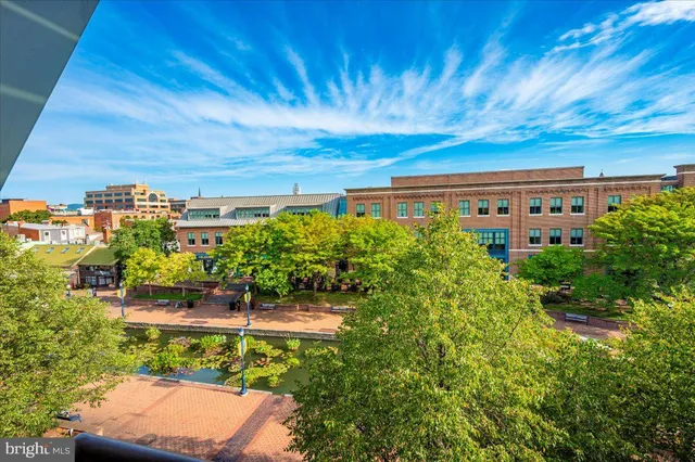 a view of a yard with an outdoor seating
