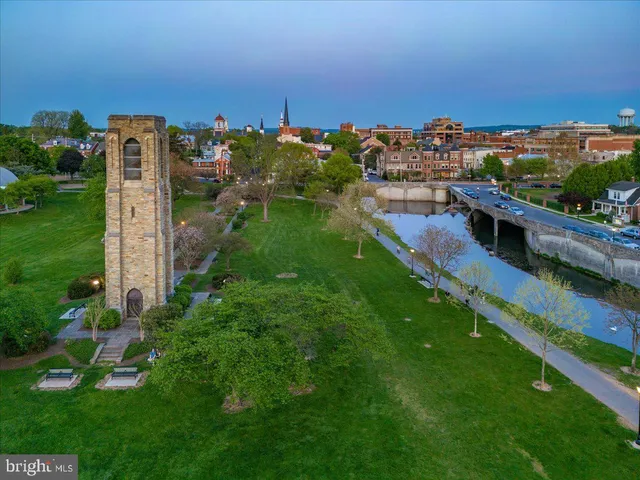a street sign on a pole on a street