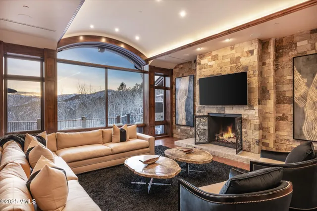 a kitchen with a sink stainless steel appliances and cabinets