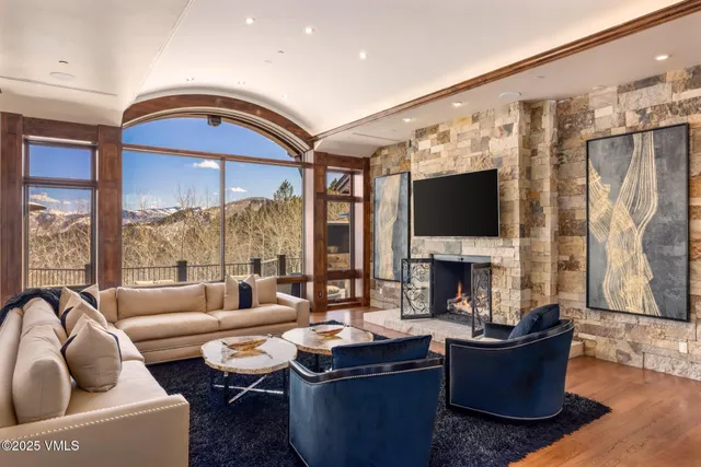 a bathroom with a toilet a sink and a mirror