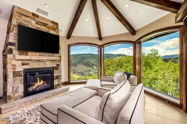 a large bathroom with double vanity sinks a large mirror and a shower