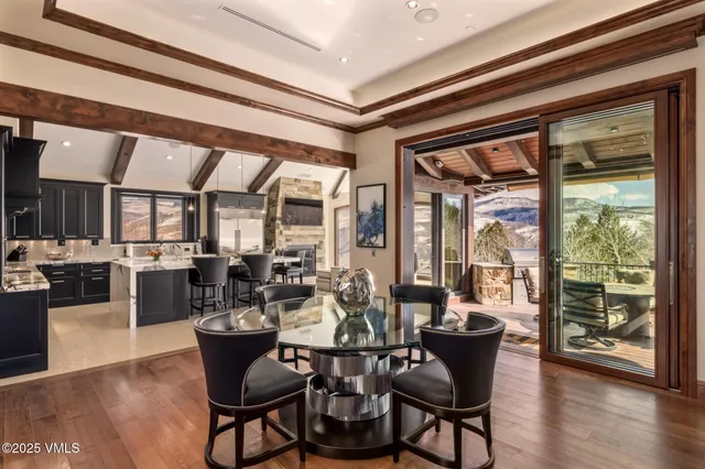 a kitchen with stainless steel appliances granite countertop a stove and a refrigerator