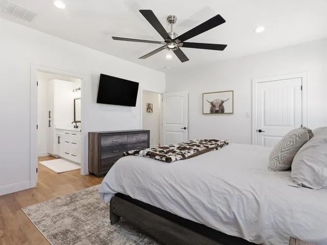 a bathroom with a double vanity sink and mirror
