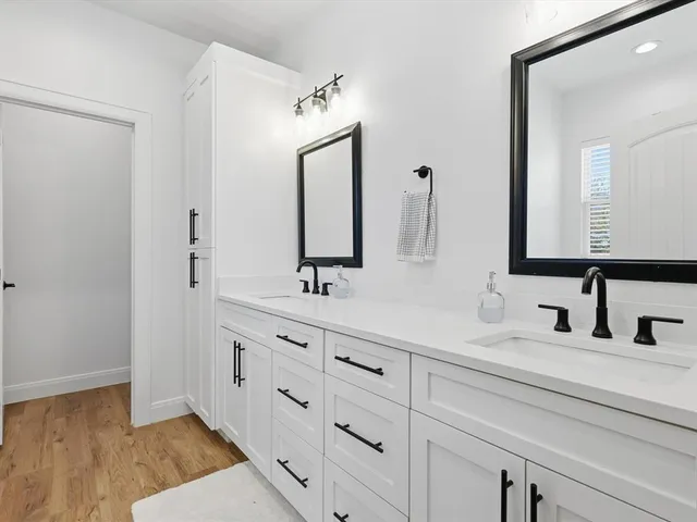 a bathroom with a bathtub and shower