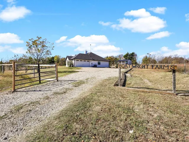 a living room with furniture fireplace and a flat screen tv