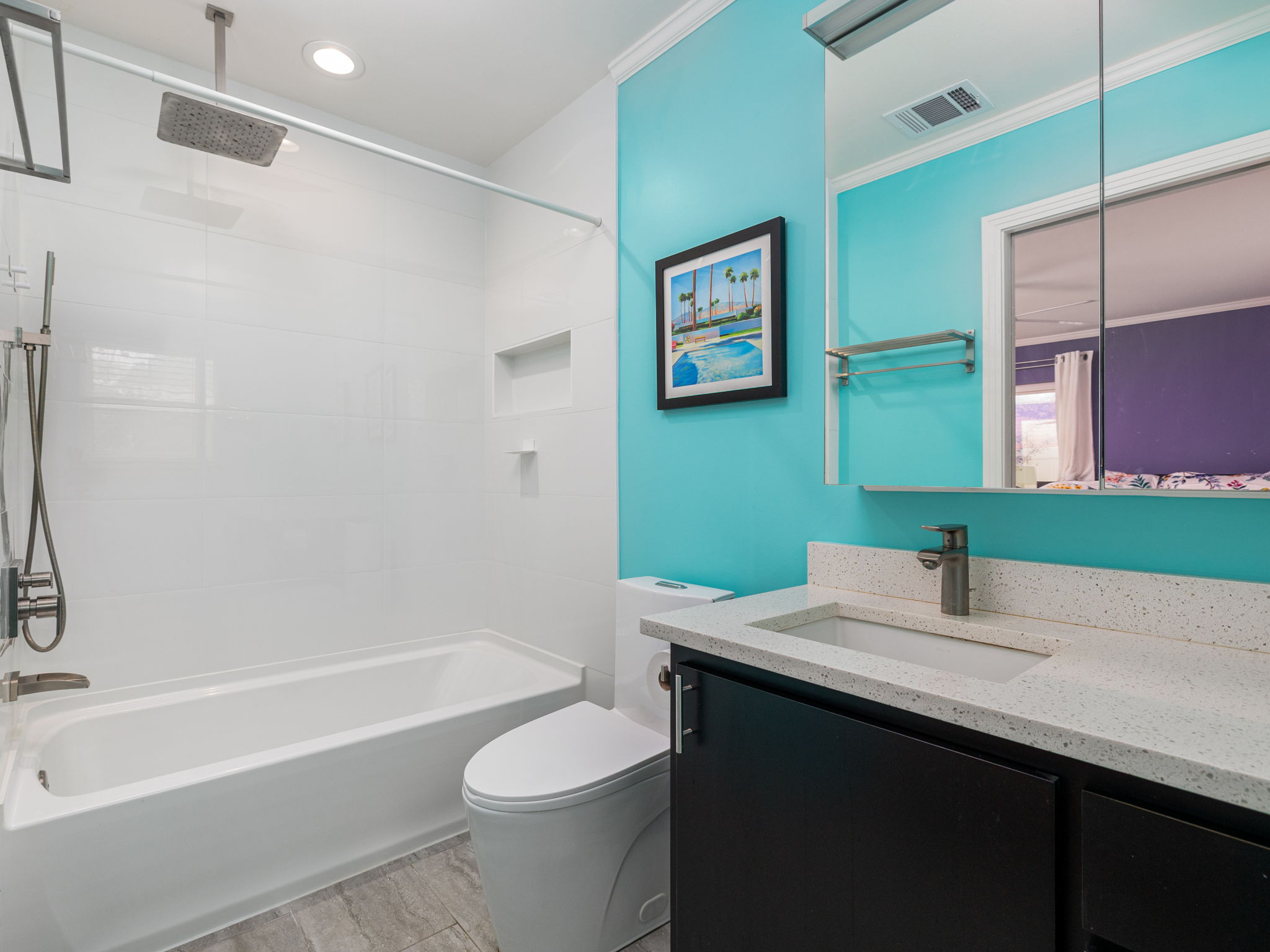 4710 Frontier Trail Austin, TX 78745 - Photo 19 of 32 a bathroom with a sink and a mirror