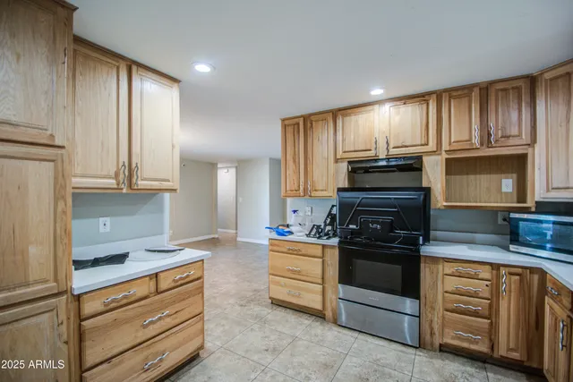a bathroom with a toilet a sink and a mirror
