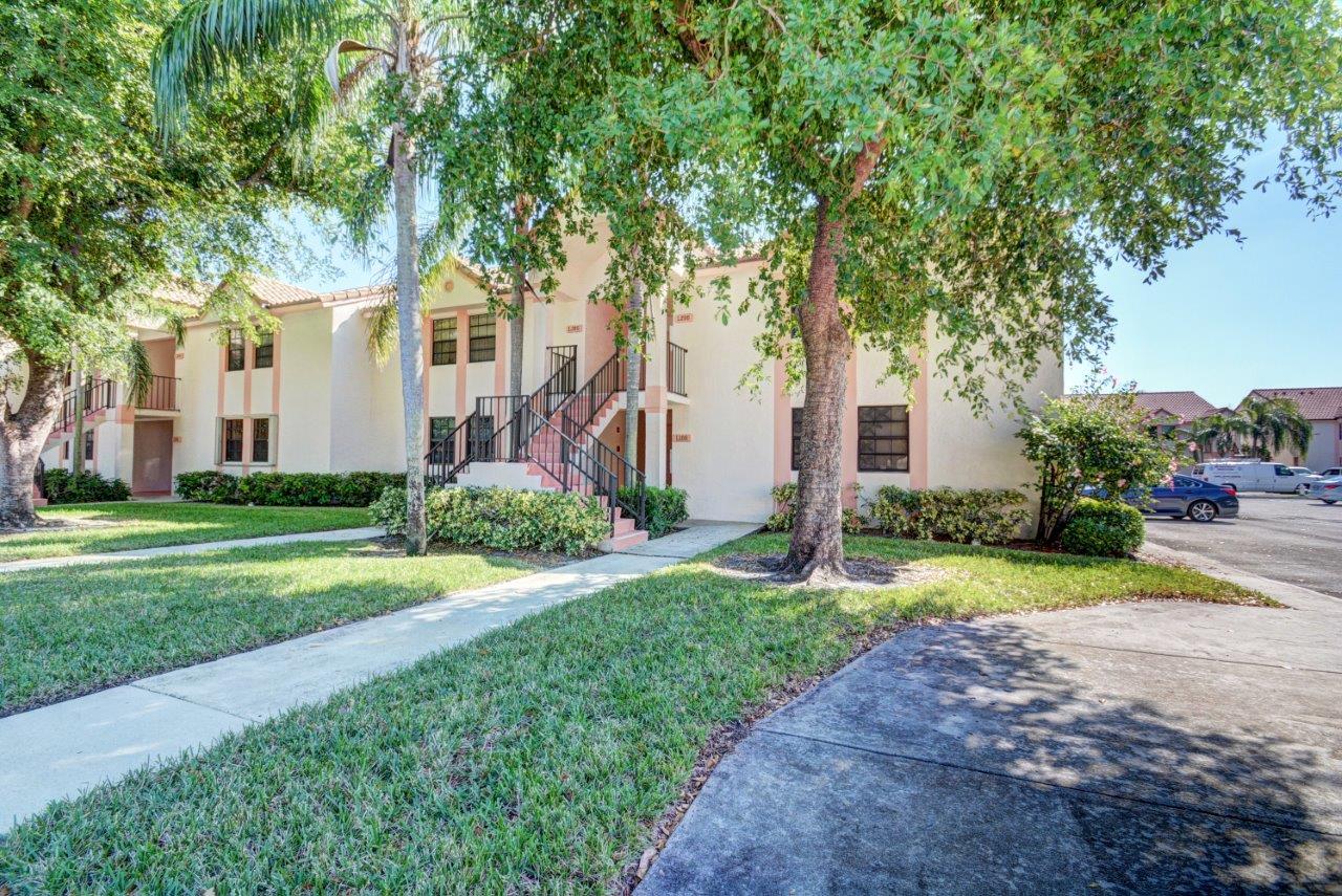 3190 Leewood Terrace, Unit L106 Boca Raton, FL 33431 - Photo 2 of 24 Front Corner Unit
