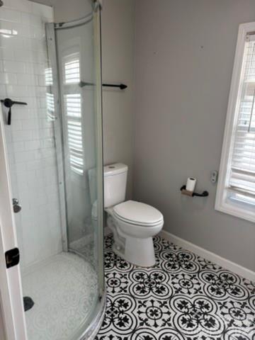 229 Browntown Road Belmont, NC 28012 - Photo 12 of 23 a bathroom with a toilet and a shower