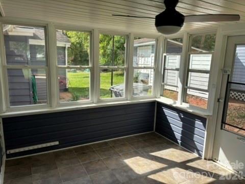 229 Browntown Road Belmont, NC 28012 - Photo 19 of 23 a room with a large window and a chandelier